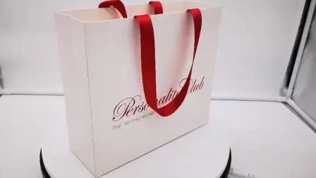 Fabrikspezifische Einkaufstüte aus recyceltem Papier mit Band
